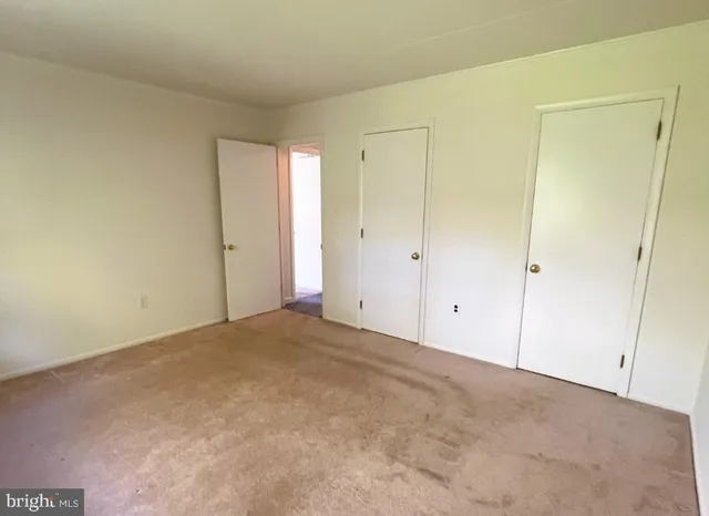 a view of hallway with a large window
