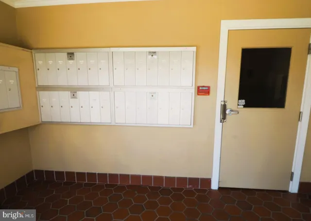 a room with furniture a desk and chair