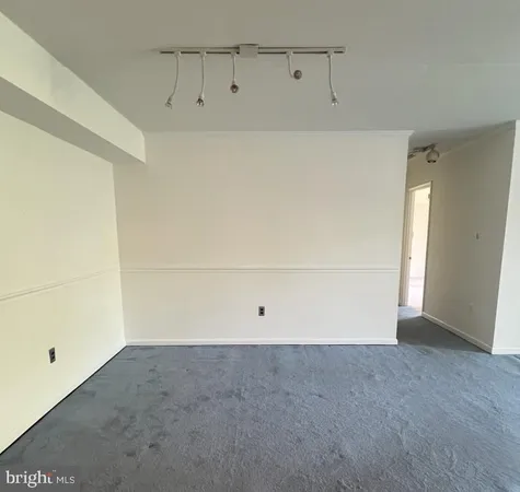 a kitchen with stainless steel appliances a refrigerator sink and cabinets
