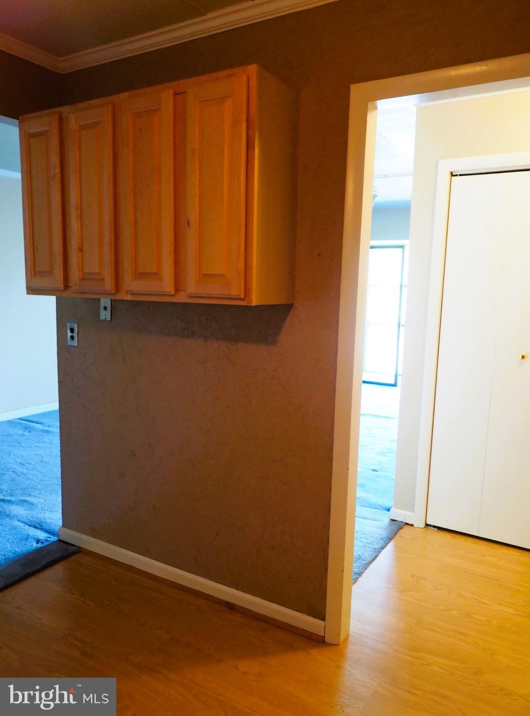84 Welsh Tract Road, Unit 311 Newark, DE 19713 - Photo 8 of 25 a view of an empty room with wooden floor