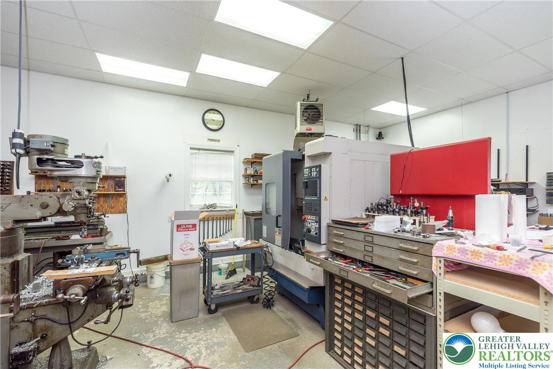 1815 Leithsville Road Hellertown, PA 18055 - Photo 30 of 38 A well-equipped workshop space offers ample room for industrial tasks and dedicated craftsmanship.