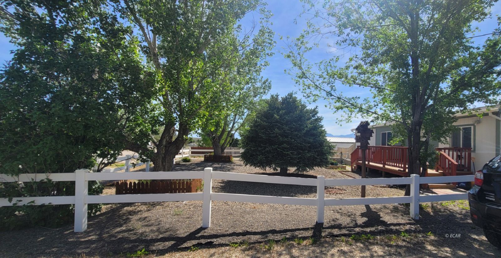 933 Spring Valley Parkway Spring Creek, NV 89815 - Photo 5 of 27 a view of a bench in the backyard