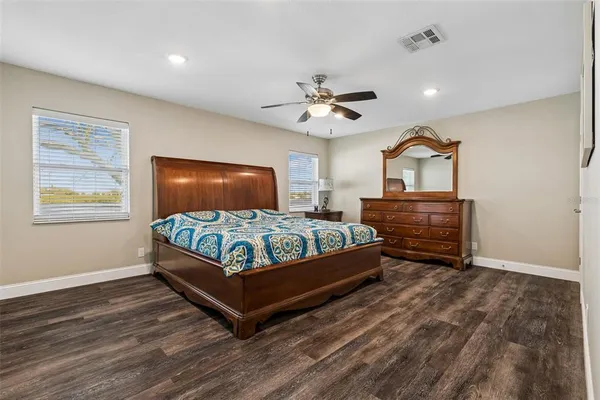 a view of a chairs and table in the balcony
