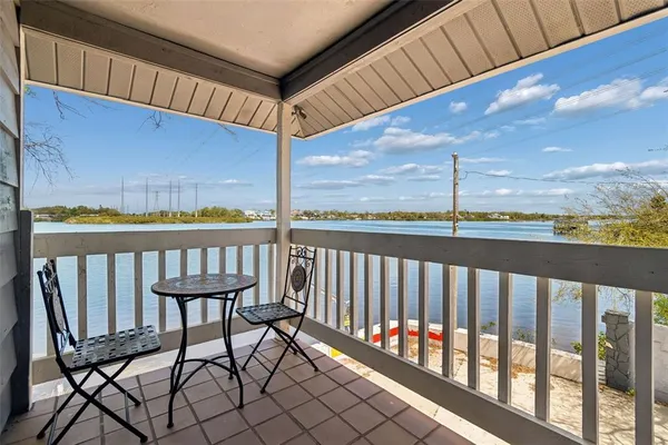 a bedroom with bed and a window