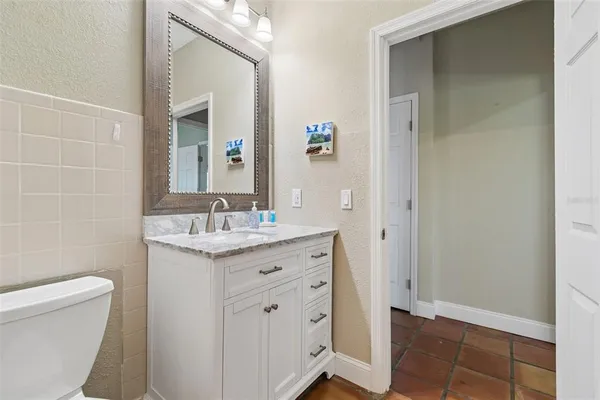 a room with furniture and a flat screen tv