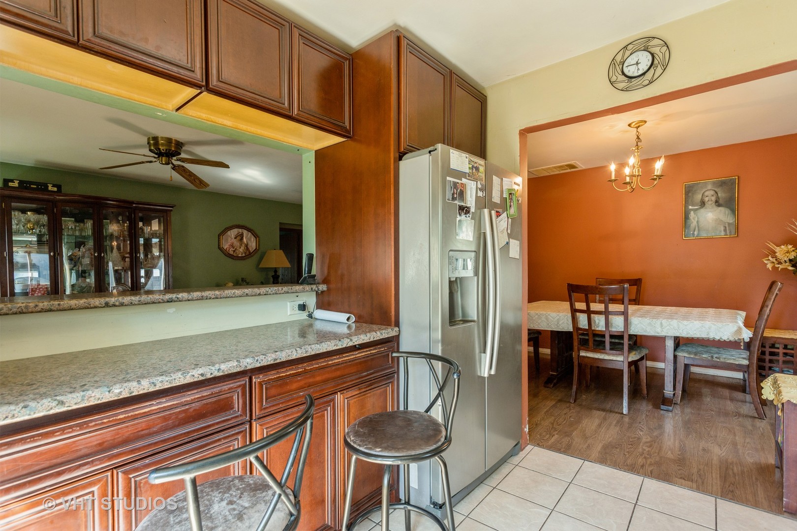 267 Westbrook Circle Naperville, IL 60565 - Photo 5 of 12 a kitchen with stainless steel appliances granite countertop a sink and a refrigerator
