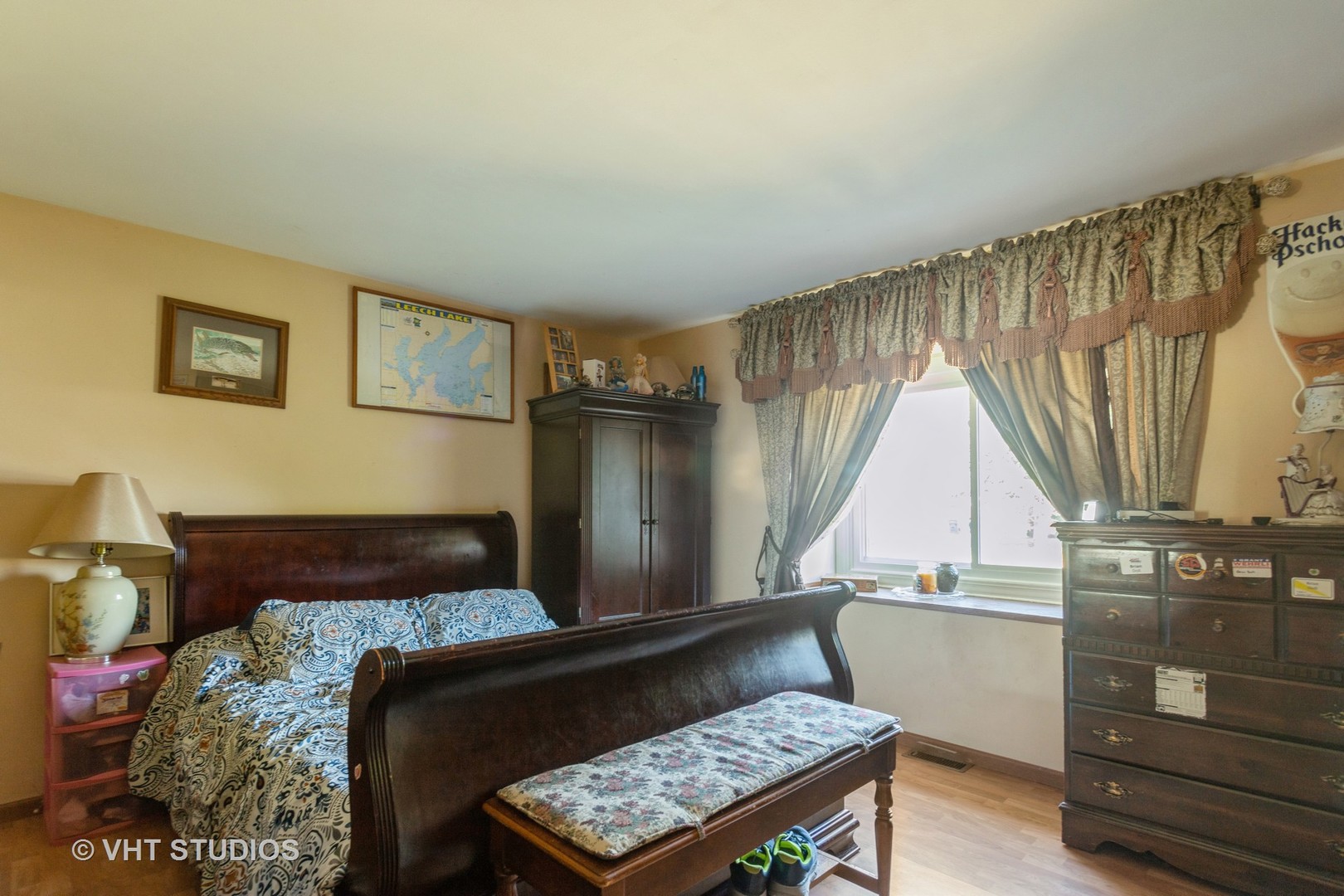 267 Westbrook Circle Naperville, IL 60565 - Photo 8 of 12 a living room with a couch and a stove