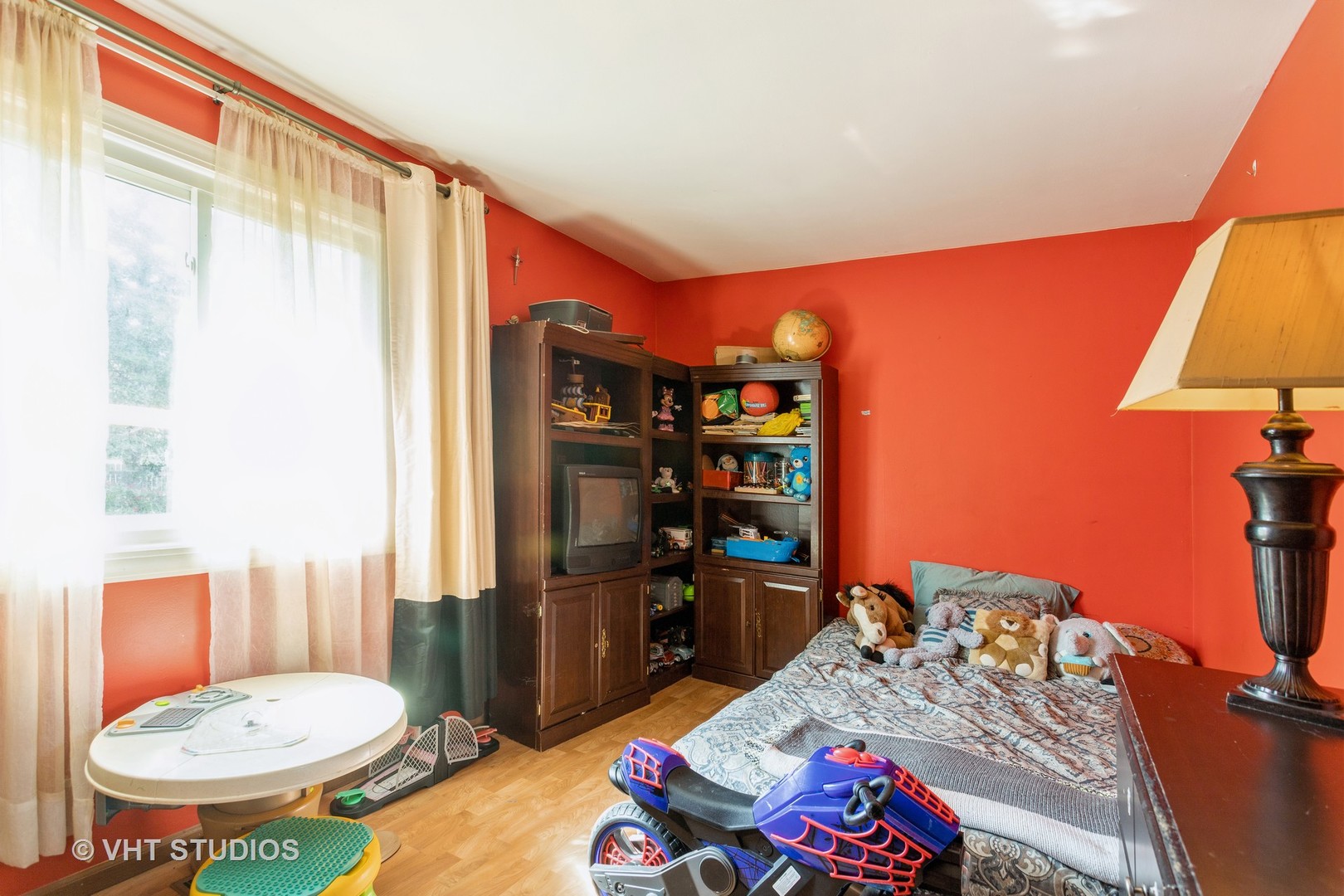 267 Westbrook Circle Naperville, IL 60565 - Photo 10 of 12 a bed room with a bed and a chair