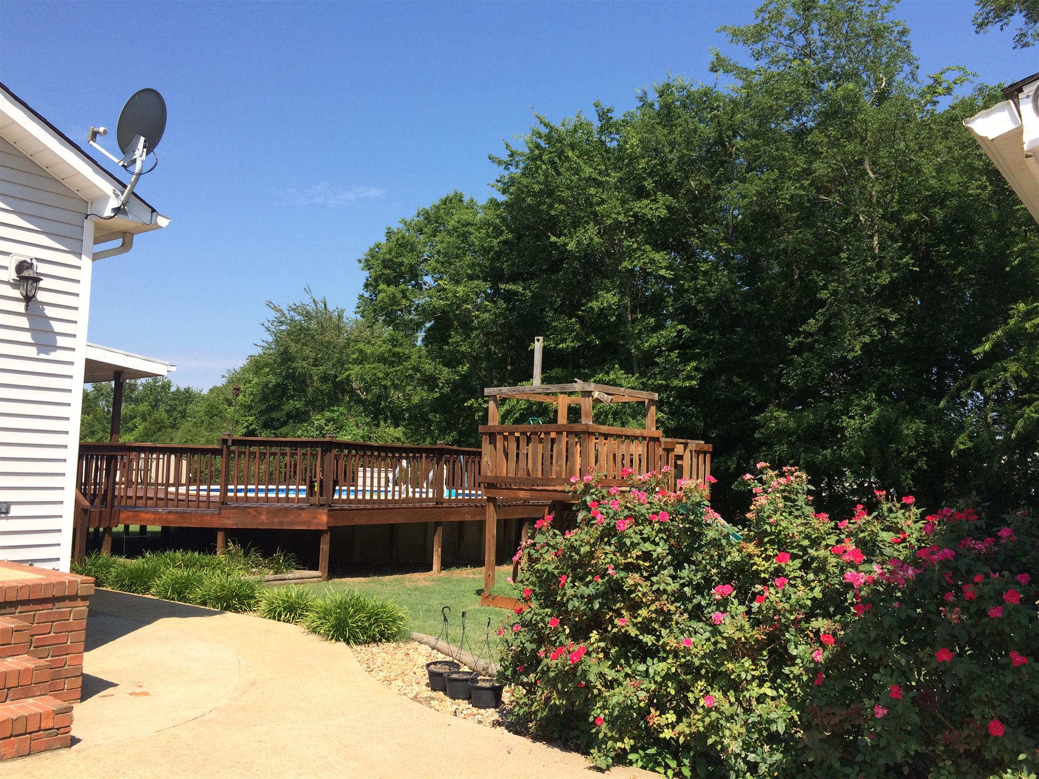 300 Rachel Road Pulaski, TN 38478 - Photo 21 of 28 View of pool and tree line at creek in back lawn