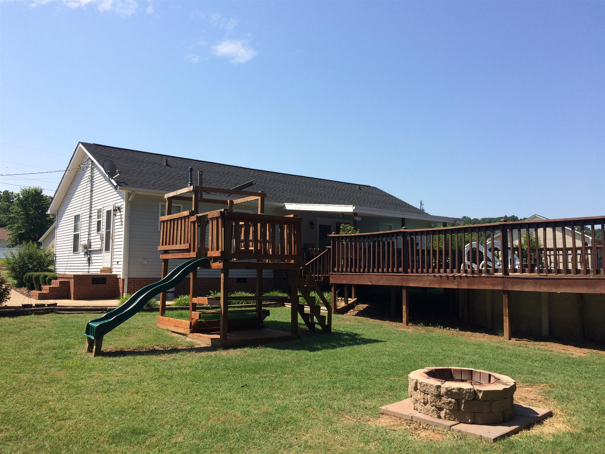 300 Rachel Road Pulaski, TN 38478 - Photo 22 of 28 Side view of back of home with one of the two fire pits.