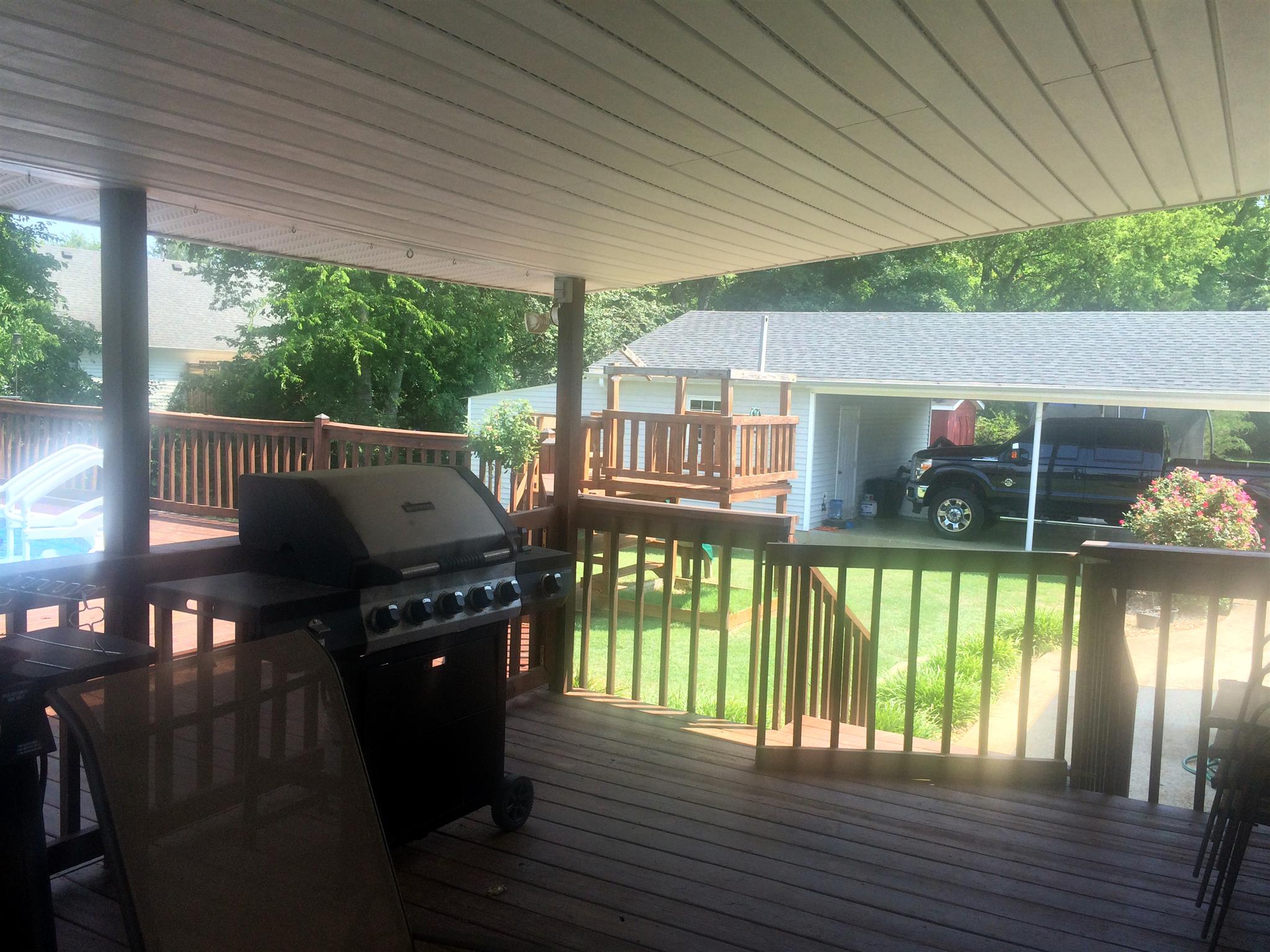 300 Rachel Road Pulaski, TN 38478 - Photo 24 of 28 View looking from back covered deck toward shop and carport. Shop has electricity.
