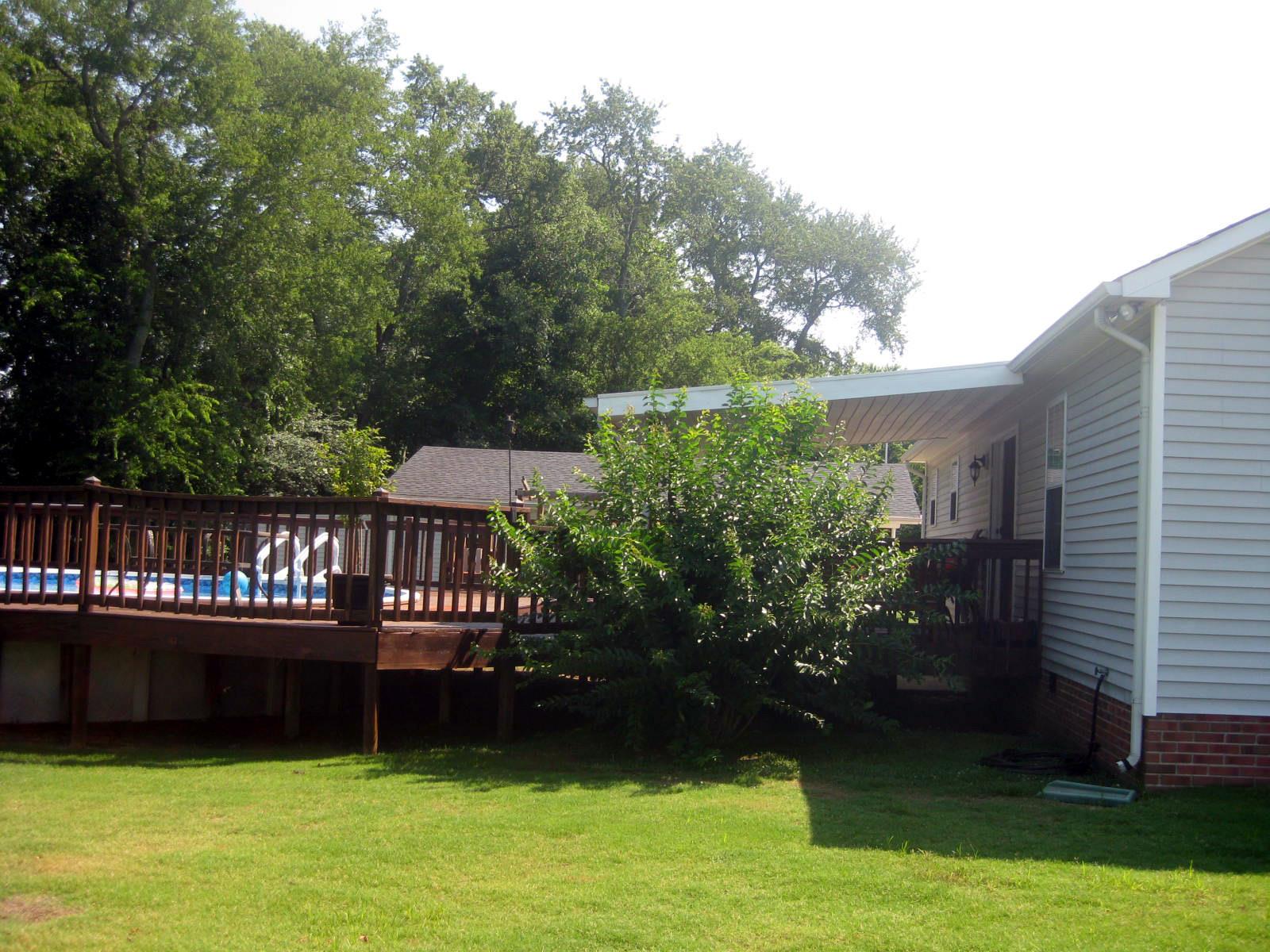 300 Rachel Road Pulaski, TN 38478 - Photo 3 of 28 Another view of the back of the home and pool area