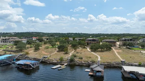 an aerial view of a houses with outdoor space