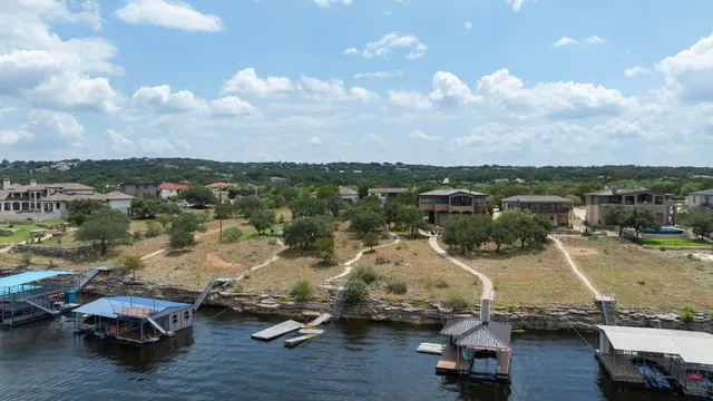 an aerial view of a houses with outdoor space