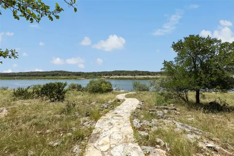a view of a lake with outdoor space