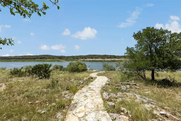 a view of a lake with outdoor space