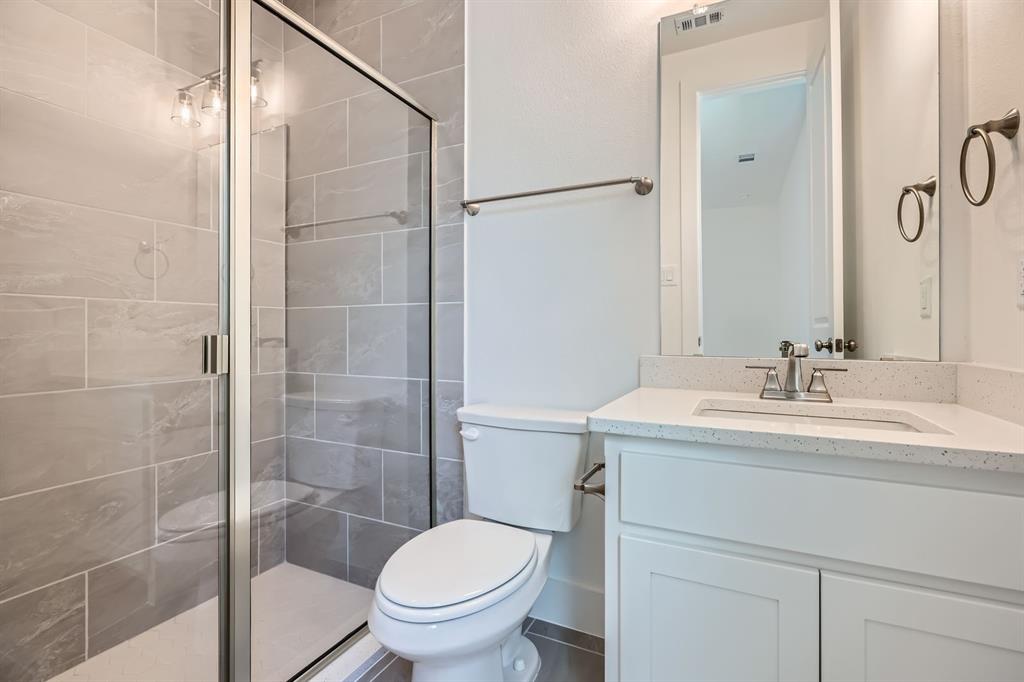 2620 Cedar Rdg Road Celina, TX 75009 - Photo 17 of 27 Bathroom with vanity and a shower stall