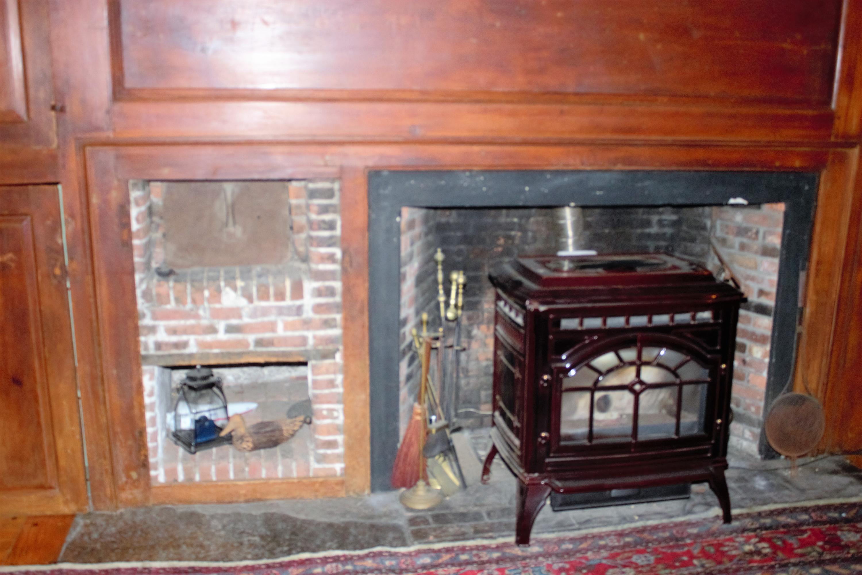 520 Main Street Wareham, MA 02571 - Photo 13 of 32 a living room with furniture and a fireplace