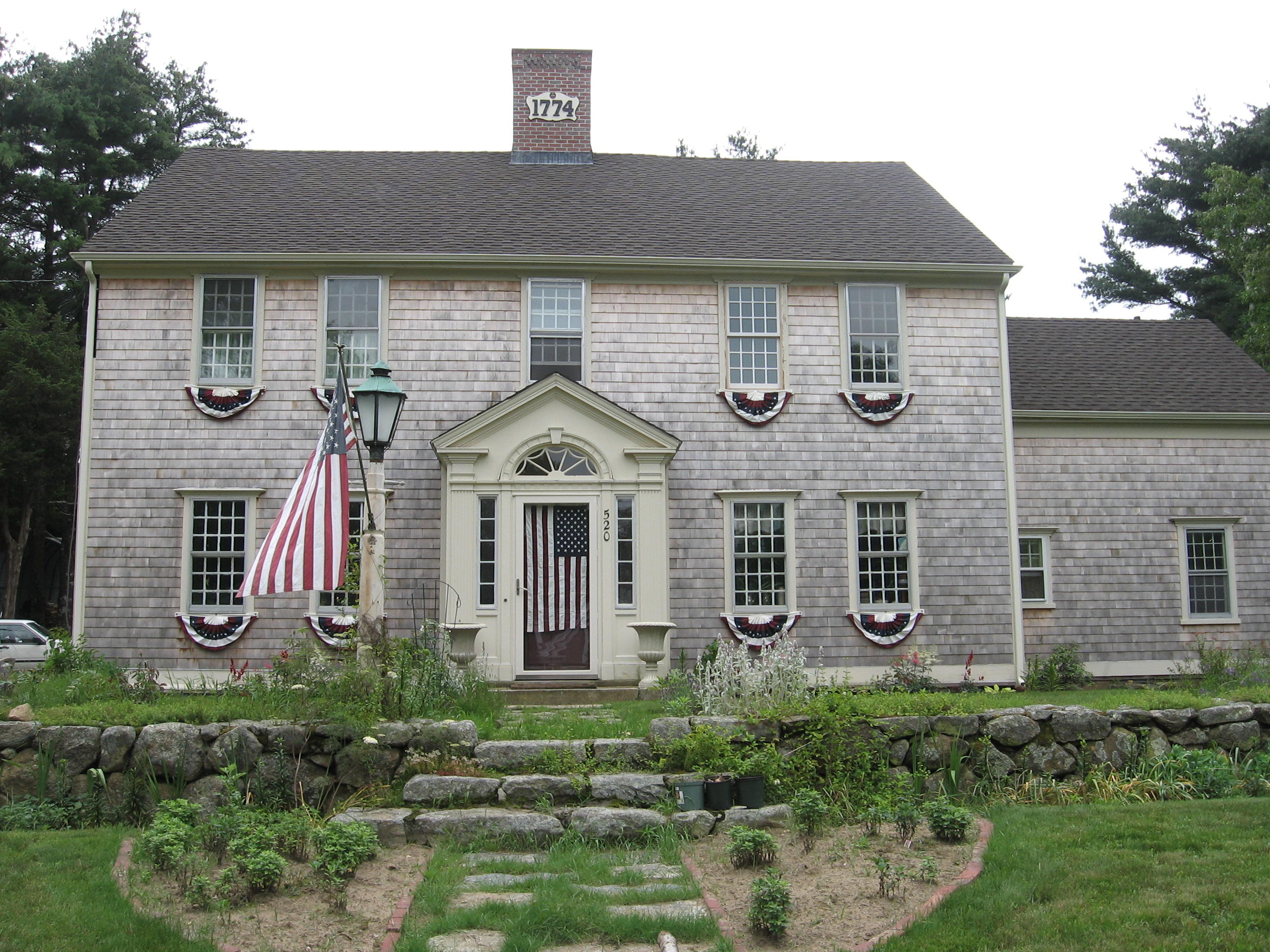 520 Main Street Wareham, MA 02571 - Photo 2 of 32 a front view of a house with a yard