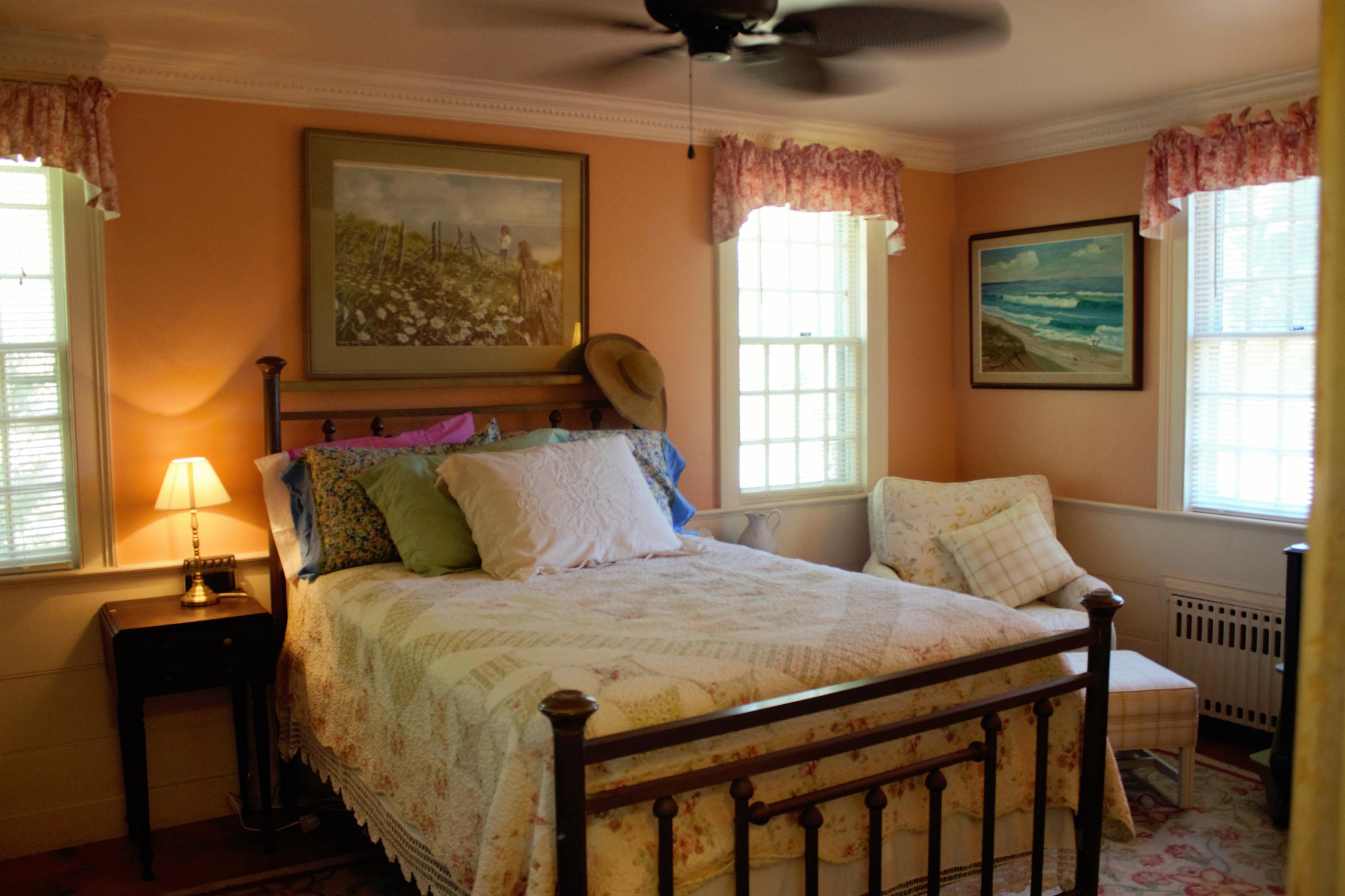 520 Main Street Wareham, MA 02571 - Photo 21 of 32 a bedroom with a bed and wooden floor