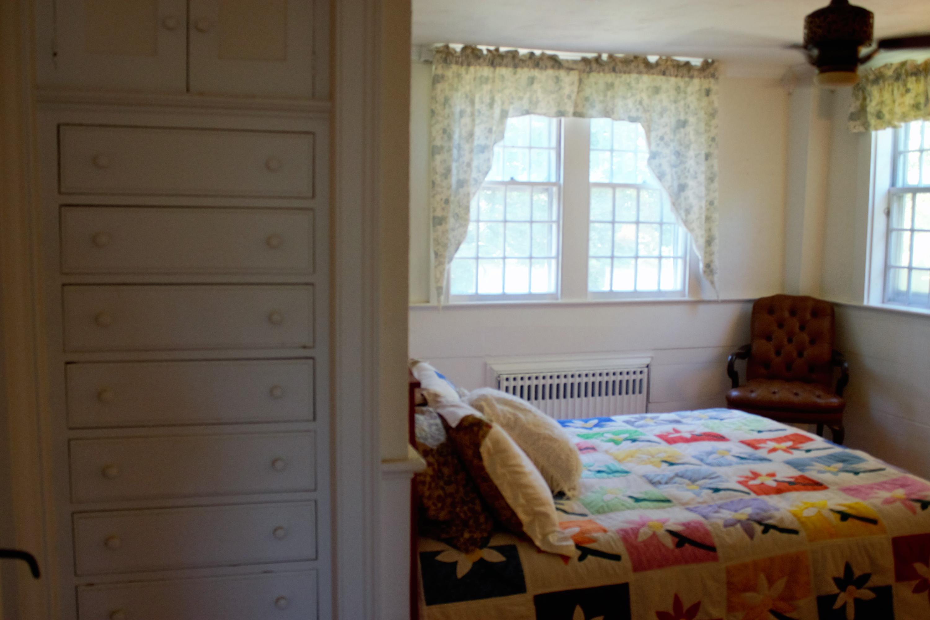 520 Main Street Wareham, MA 02571 - Photo 22 of 32 a bedroom with a bed and a window