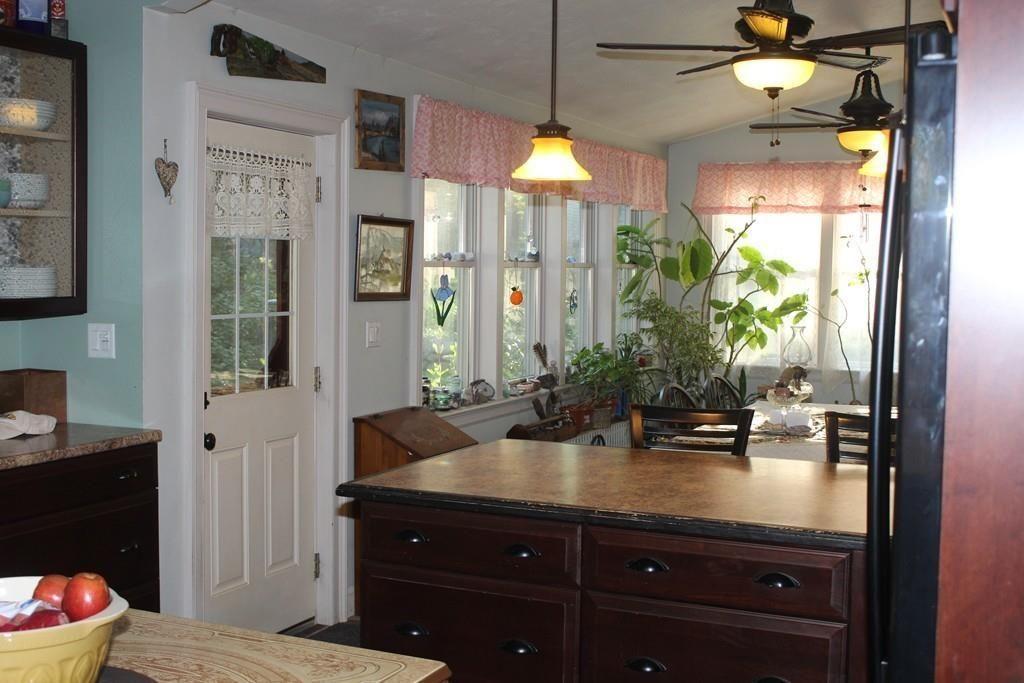 520 Main Street Wareham, MA 02571 - Photo 5 of 32 a bathroom with a sink a vanity and a mirror