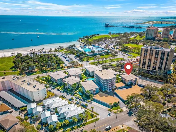 a view of a city with an ocean