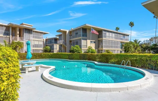a view of a house with a swimming pool