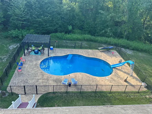 a view of outdoor space yard and swimming pool