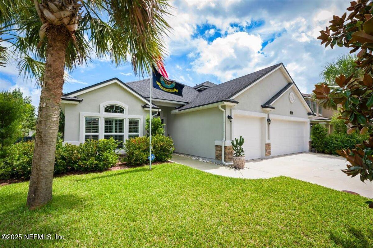 486 Porta Rosa Circle St. Augustine, FL 32092 - Photo 38 of 38 a house view with a garden space