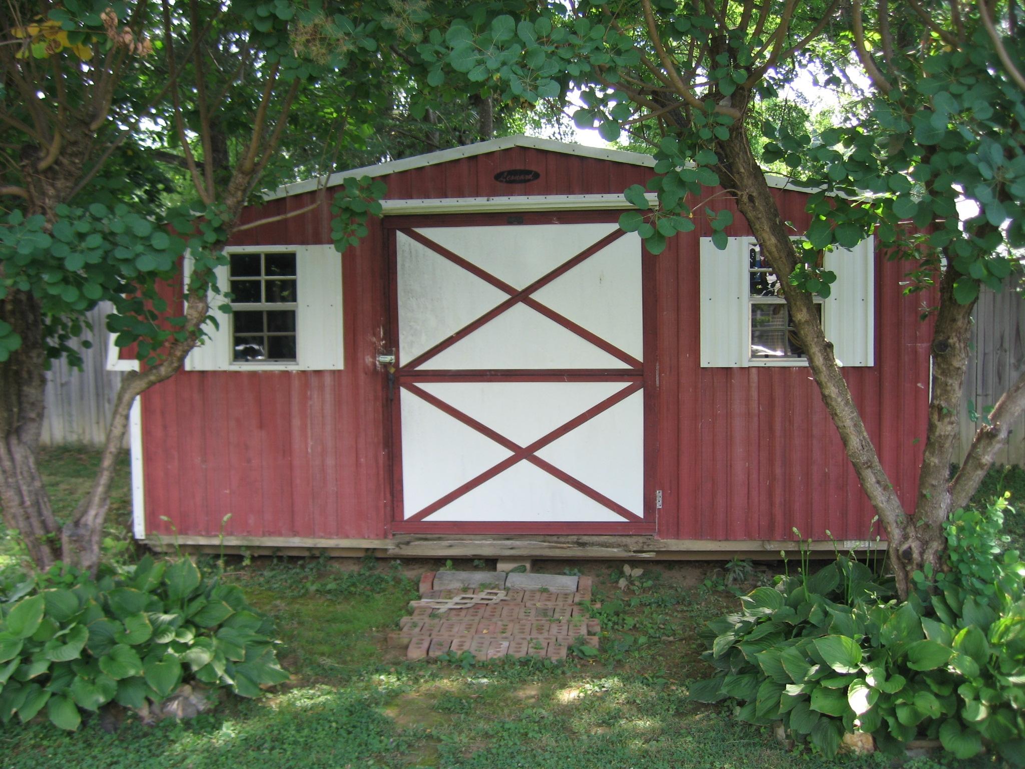 222 Ross Street Salem, VA 24153 - Photo 14 of 17 a front view of a house with garden