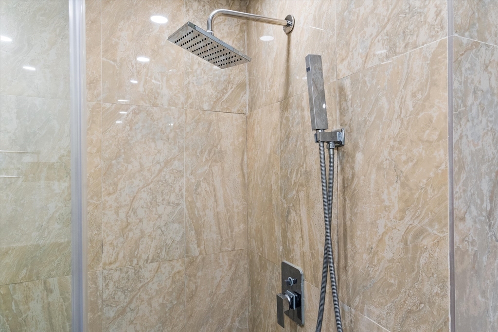 45 Christopher Drive, Unit 93 Methuen, MA 01844 - Photo 17 of 37 a bathroom with a shower