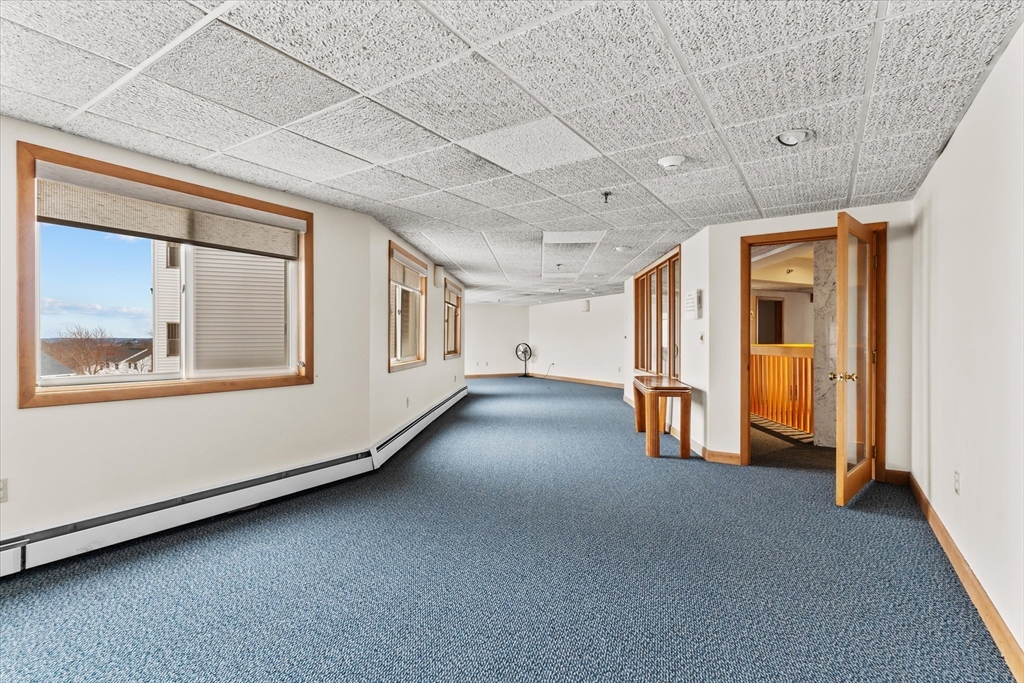 45 Christopher Drive, Unit 93 Methuen, MA 01844 - Photo 28 of 37 a view of an empty room with a window