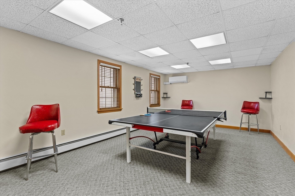 45 Christopher Drive, Unit 93 Methuen, MA 01844 - Photo 29 of 37 a room with furniture pool table and window