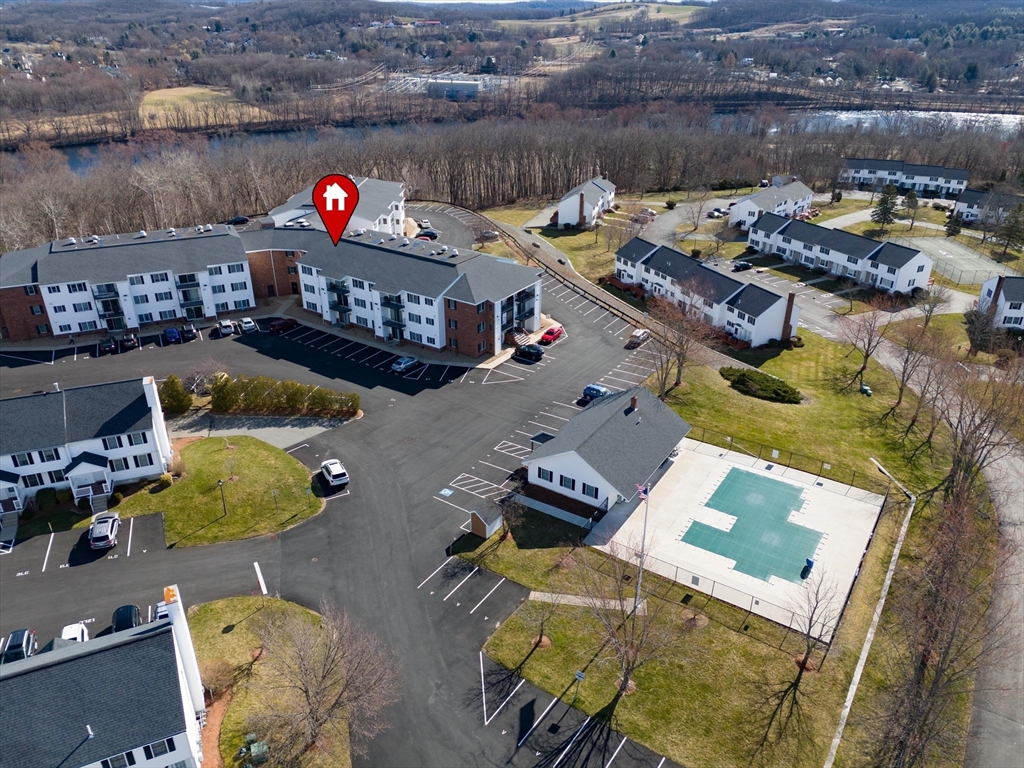 45 Christopher Drive, Unit 93 Methuen, MA 01844 - Photo 3 of 37 an aerial view of a house with swimming pool