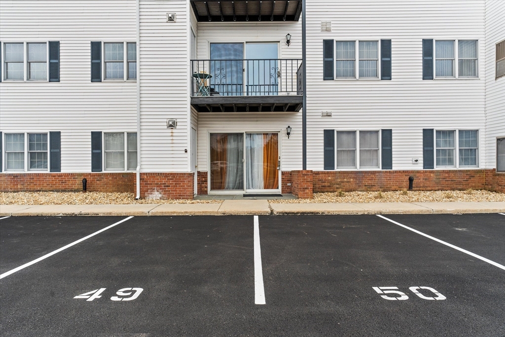 45 Christopher Drive, Unit 93 Methuen, MA 01844 - Photo 32 of 37 a view of a house with a street