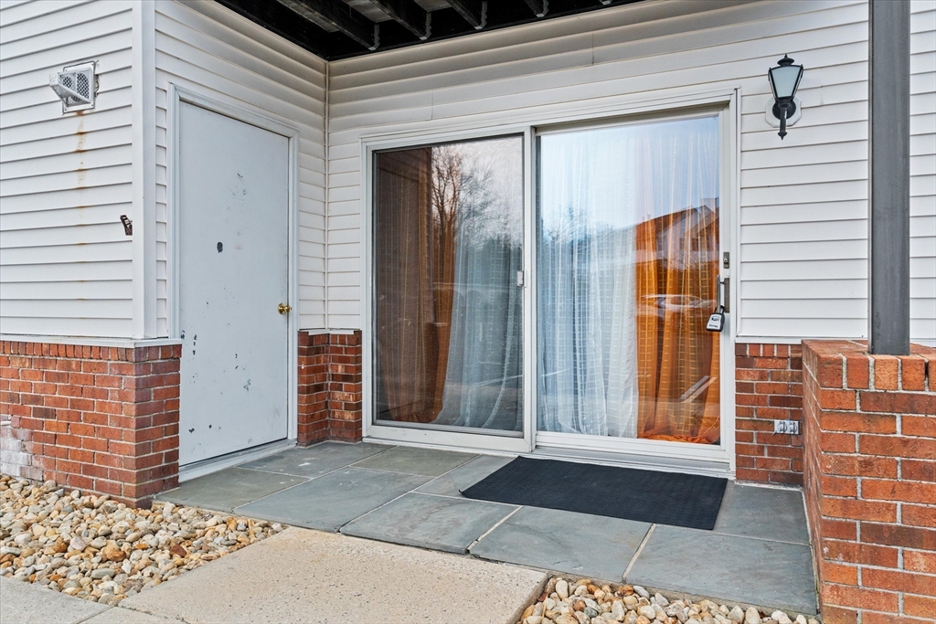45 Christopher Drive, Unit 93 Methuen, MA 01844 - Photo 4 of 37 a view of a entryway door front of house