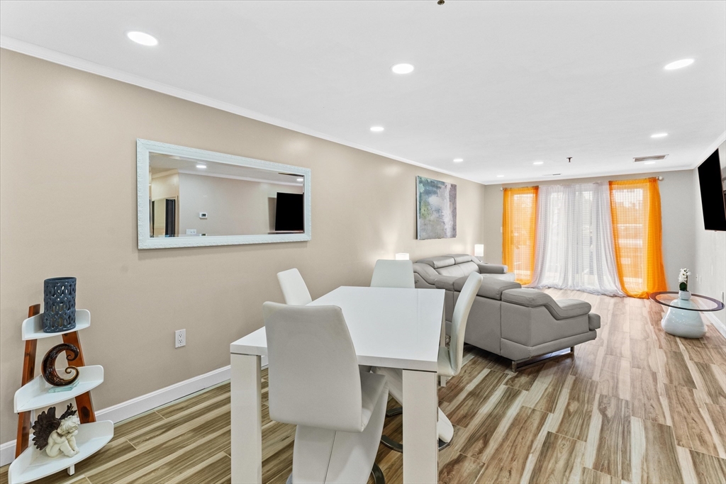 45 Christopher Drive, Unit 93 Methuen, MA 01844 - Photo 7 of 37 a living room with furniture and a window