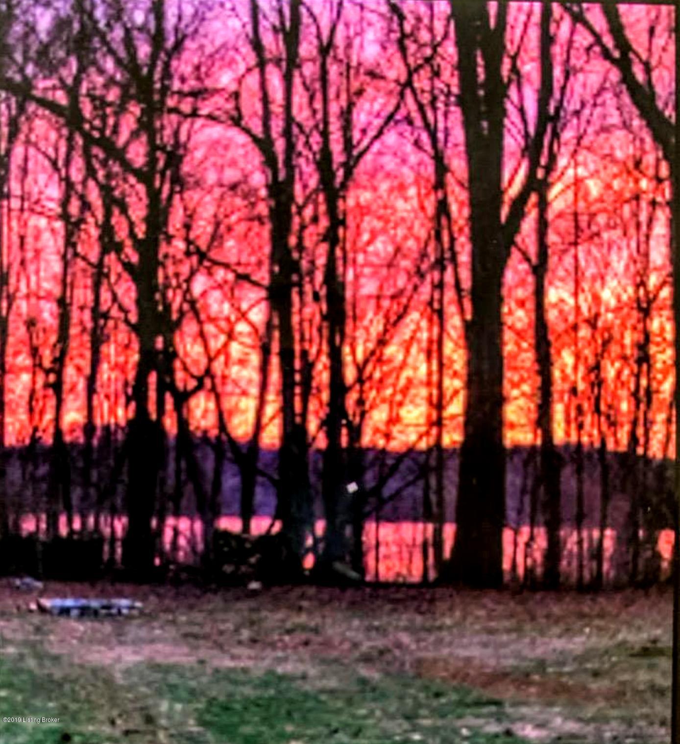 Spectacular sunsets over the river you will enjoy from inside the home and from the patio and spacious yard for much of the year!