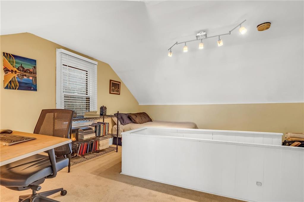 164 37th Street Pittsburgh, PA 15201 - Photo 15 of 24 a room with a bed and furniture