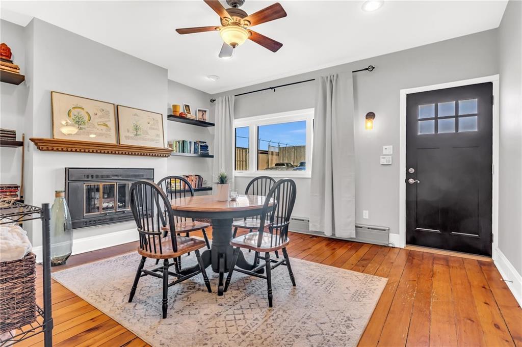 164 37th Street Pittsburgh, PA 15201 - Photo 2 of 24 a view of a dining room with furniture and wooden floor