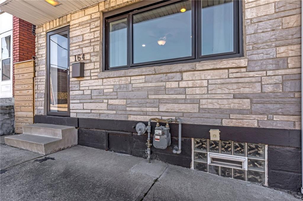164 37th Street Pittsburgh, PA 15201 - Photo 24 of 24 a bathroom with a sink and a mirror