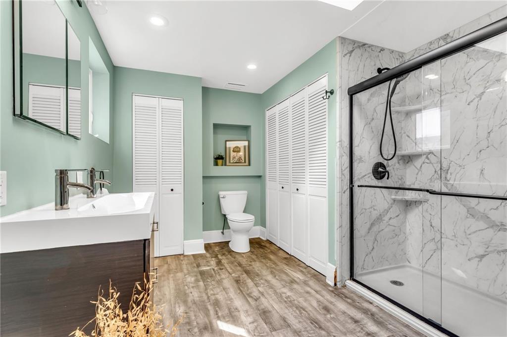 164 37th Street Pittsburgh, PA 15201 - Photo 9 of 24 a bathroom with a sink toilet and shower