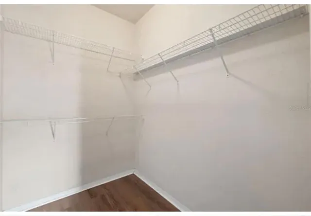 a view of small space with racks on the wall