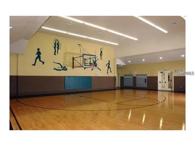 a view of a living room and kitchen
