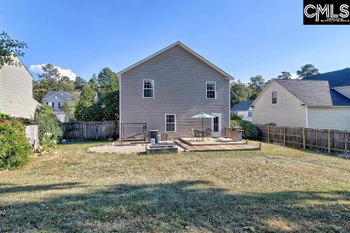 209 Eagle Pointe Drive Chapin, SC 29036 - Photo 36 of 40 a view of a house with backyard and sitting area