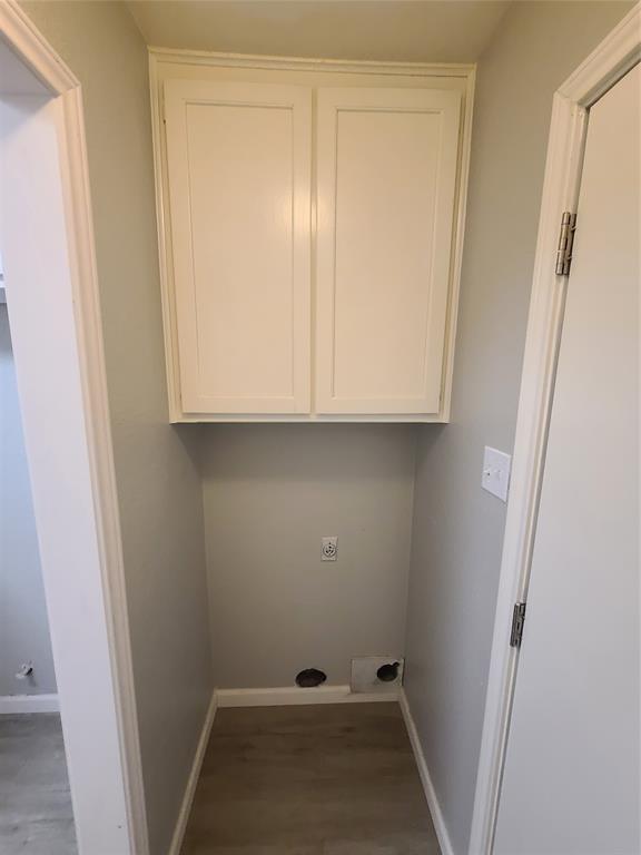 343 Spring Branch Lane Kennedale, TX 76060 - Photo 12 of 39 a view of storage and utility room with wooden floor
