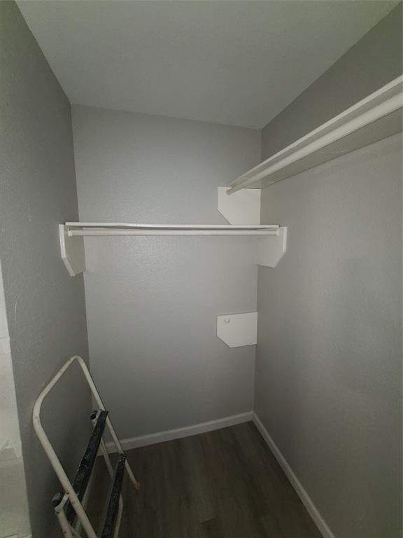 343 Spring Branch Lane Kennedale, TX 76060 - Photo 25 of 39 a view of storage and utility room with racks on the wall