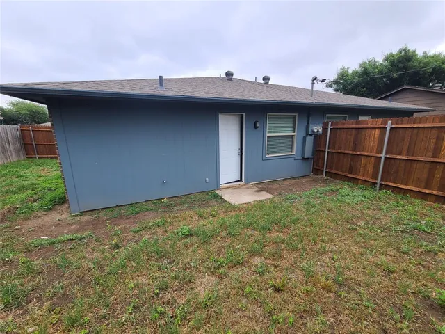 a view of a backyard with a garden