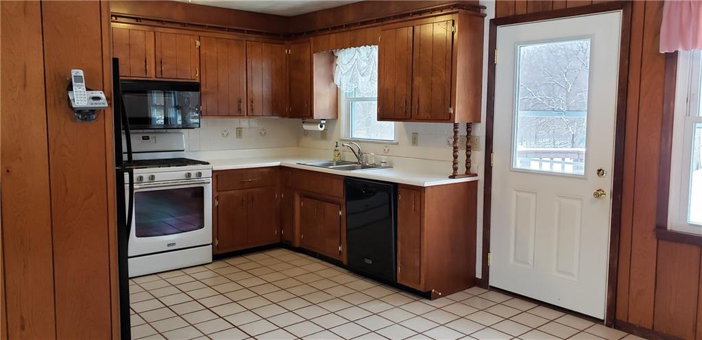 969 Edmon Road Apollo, PA 15613 - Photo 8 of 25 Door from kitchen leads to your backyard! Green all around you!